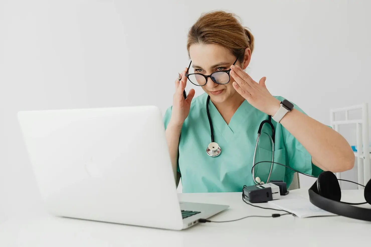 doctor with laptop - doctors offer same day appointments