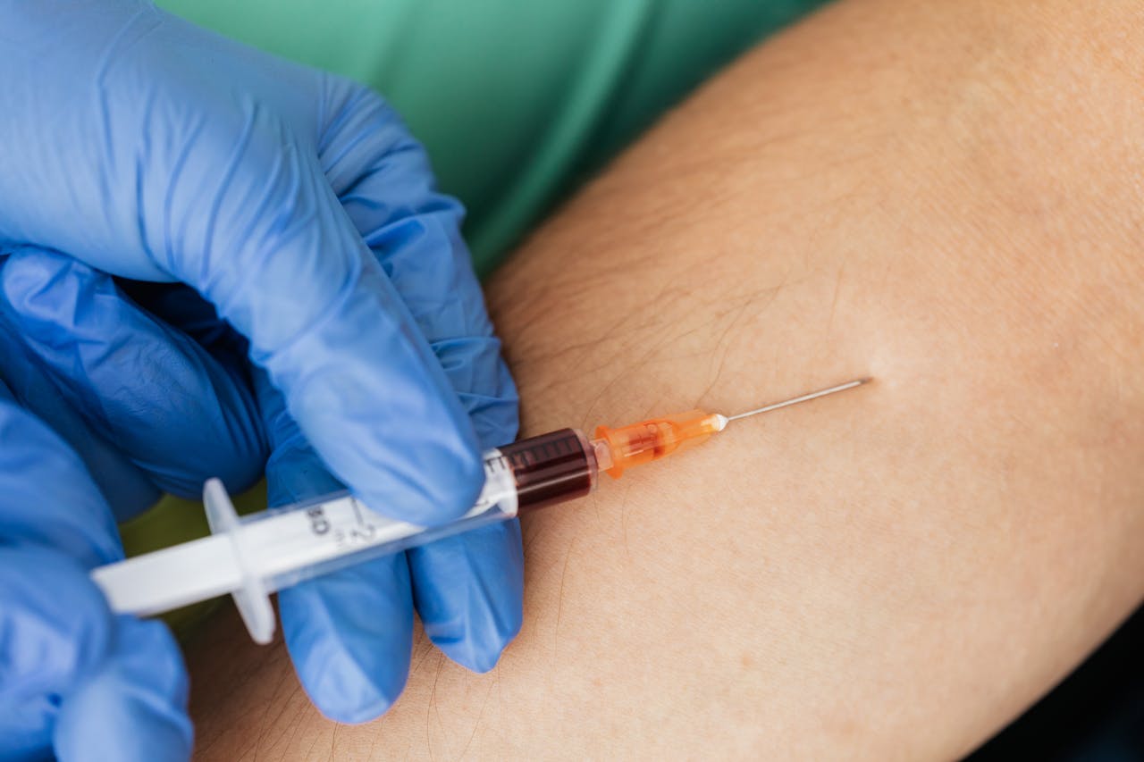 person getting blood test - Preventative Health Screenings