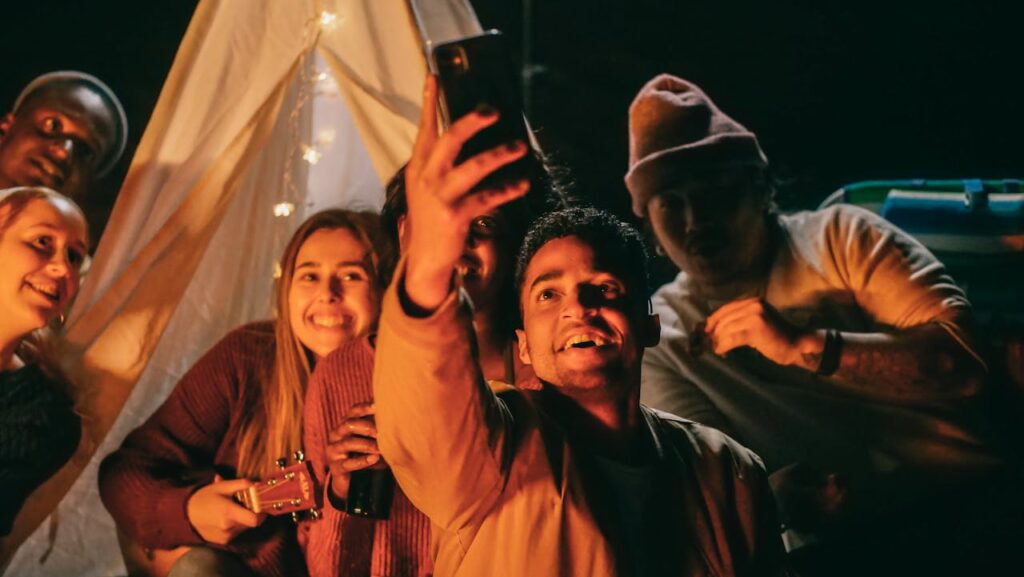 group of people taking a photo - social connection outperforms medication
