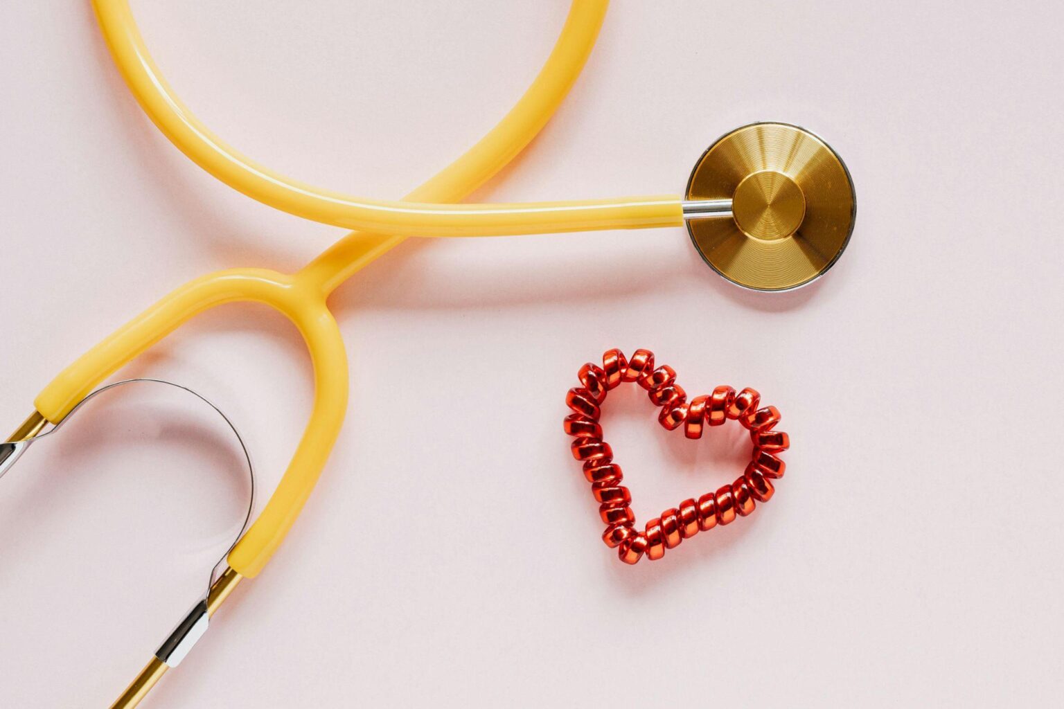 stethoscope and heart-shaped hair tie