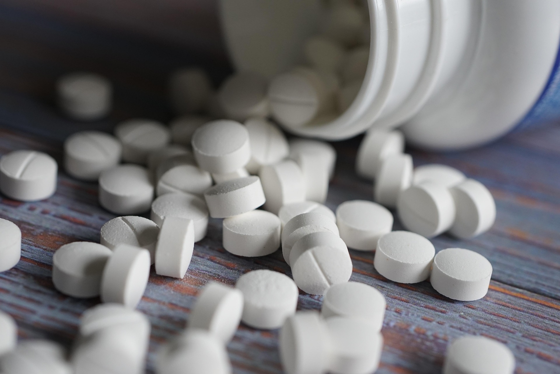 medications spilling out of a bottle