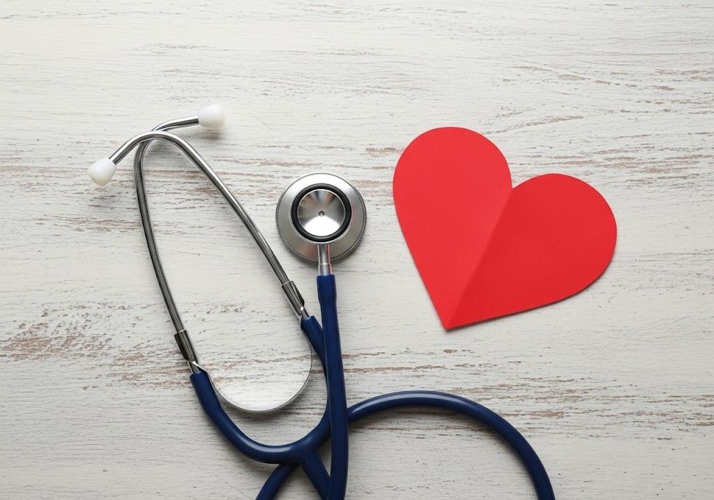 stethoscope and cutout heart on table