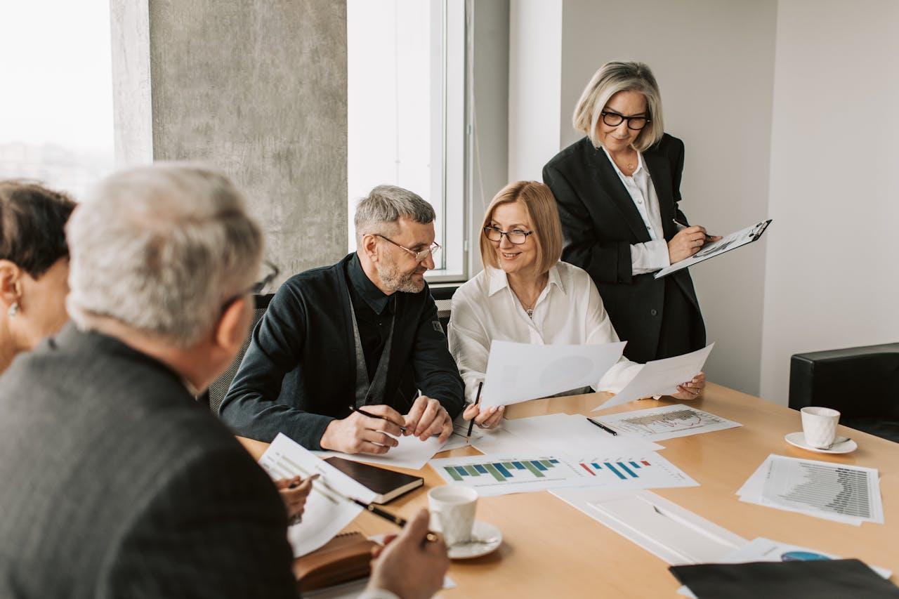 people busy in a meeting