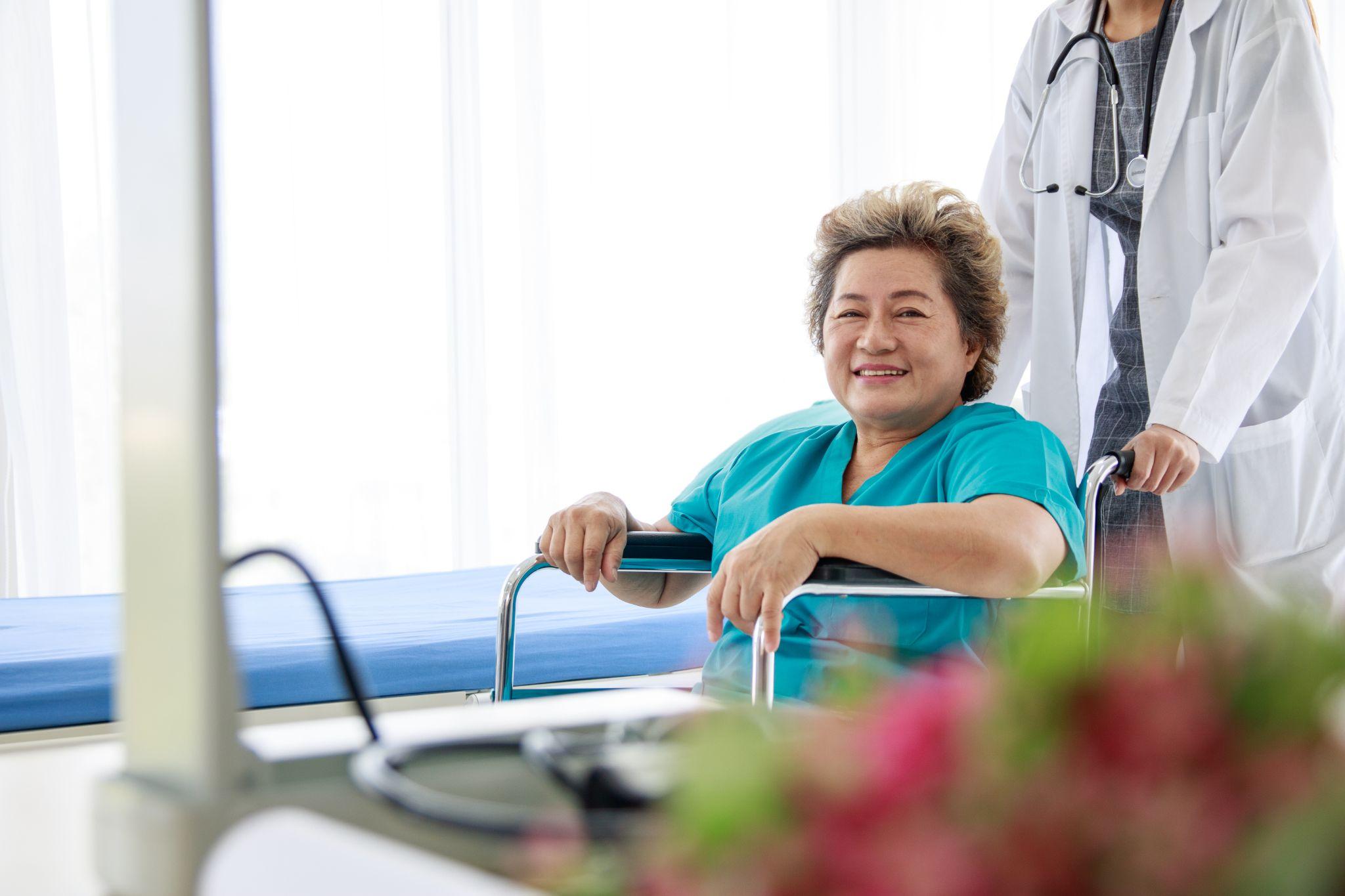 woman smiling while on wheelchair