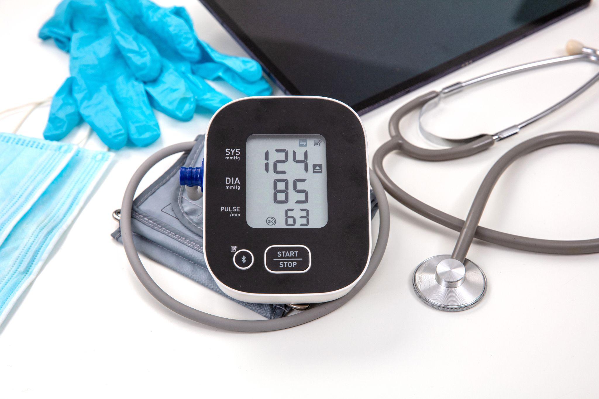 blood pressure cuff, representing the importance of monitoring and managing chronic conditions