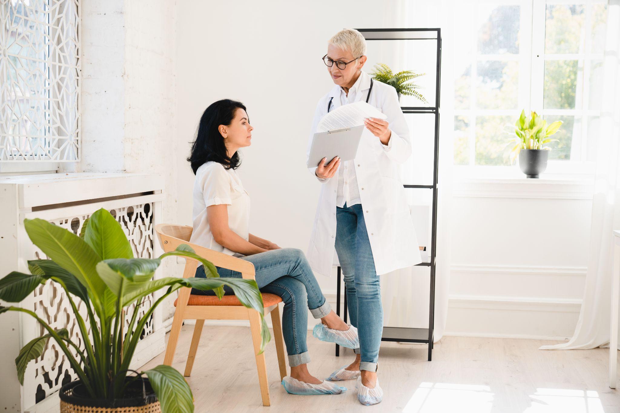 Doctor reviewing preventive screenings with a patient during Women’s Health Services in Humble TX.