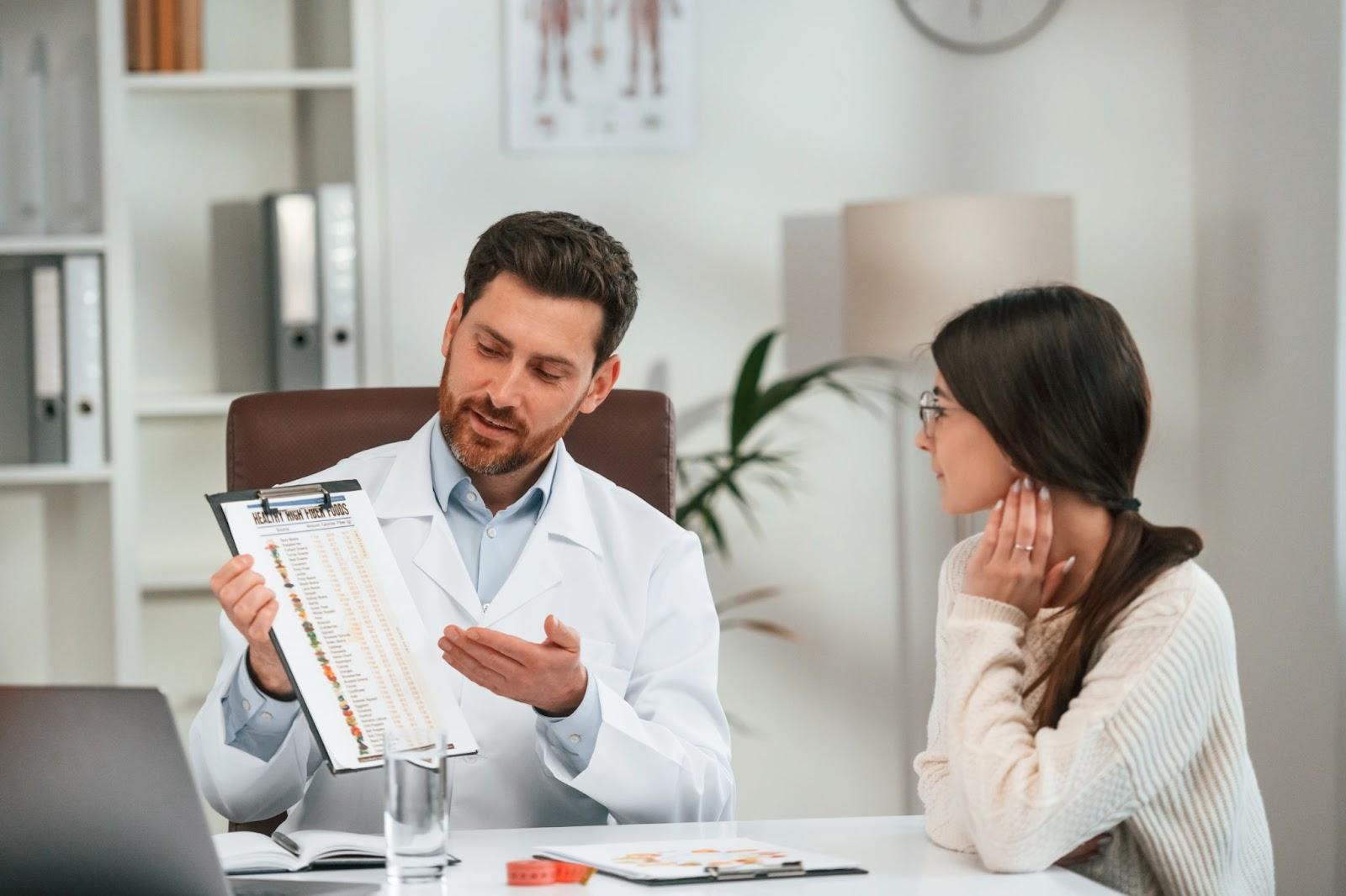 Doctor reviewing preventive health results during wellness exam in Humble TX