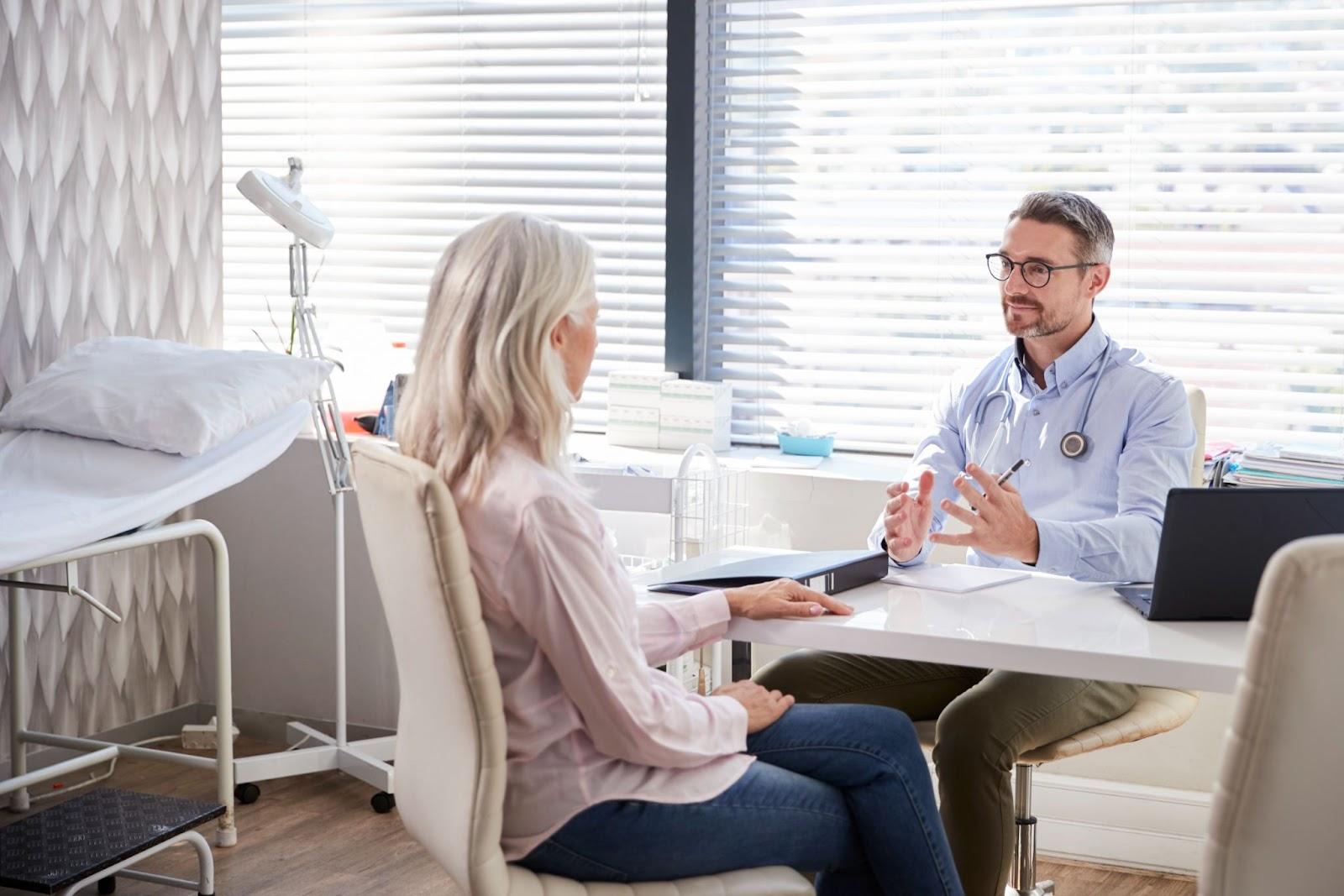 Discussing membership options and transparent pricing at a local DPC practice.