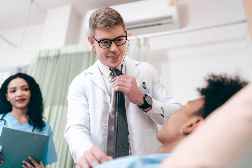 Doctor and nurse providing compassionate care to a patient during Chronic Care Management in Humble TX.