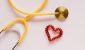 stethoscope and heart-shaped hair tie
