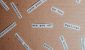 cutouts of printed words and phrases related to mental health on a cardboard surface